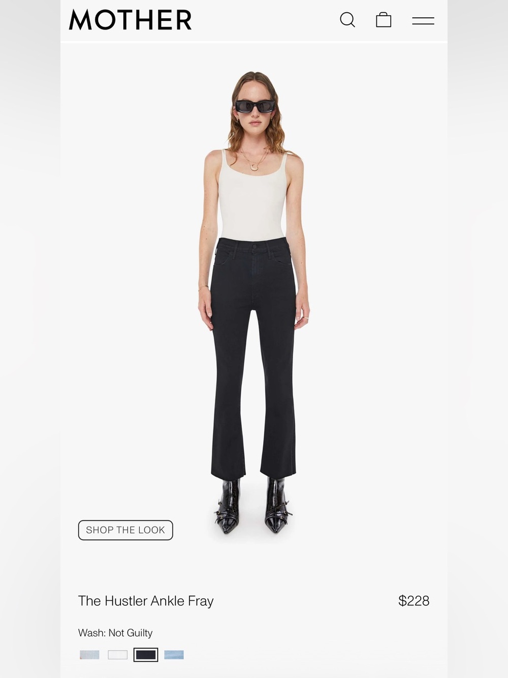 MOTHER Black Jeans with White Brand Tag